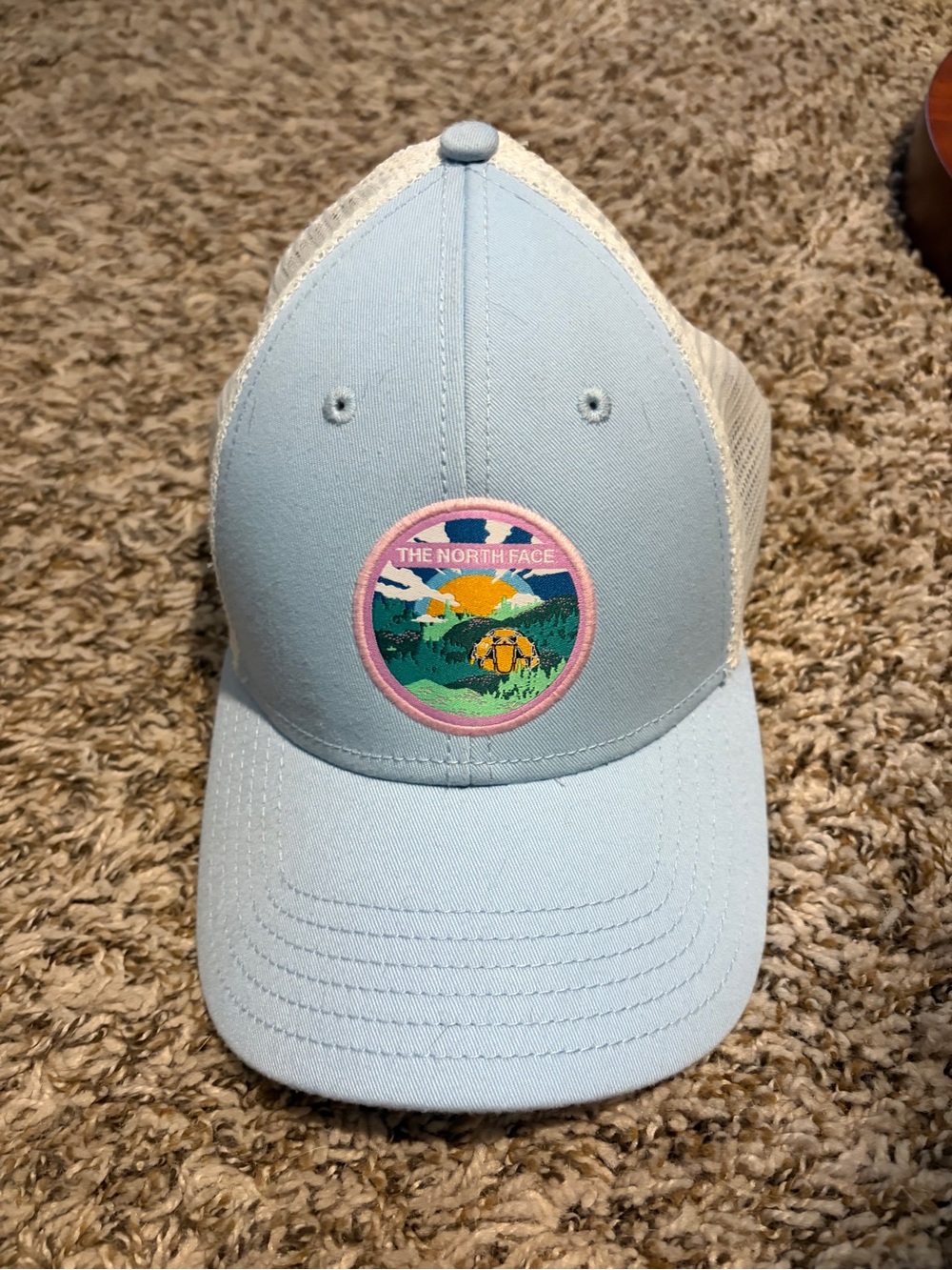 The North Face Light Blue and White Mesh Trucker Hat with Scenic Patch